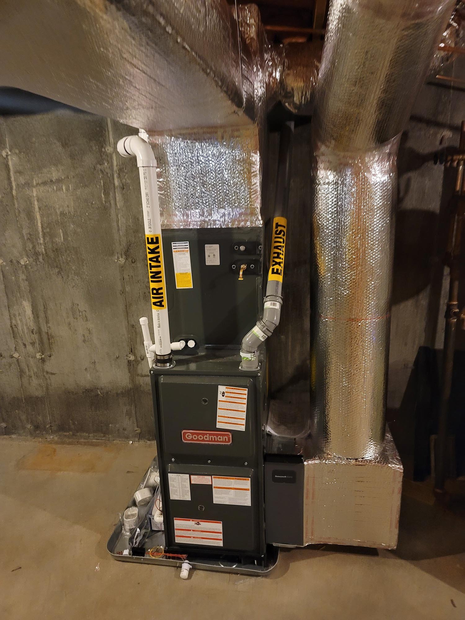 AIRMAX outdoor air conditioning units installed at a home